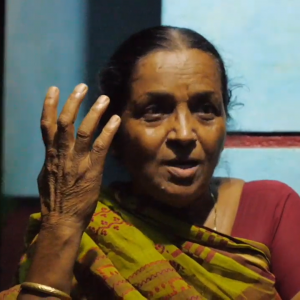 A woman gesturing while telling a story